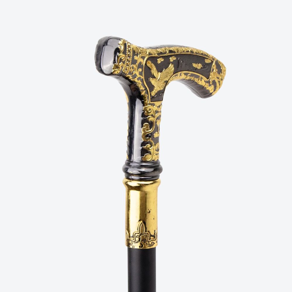 Elegant walking stick with golden eagle handle and dark wood - Bastoni
