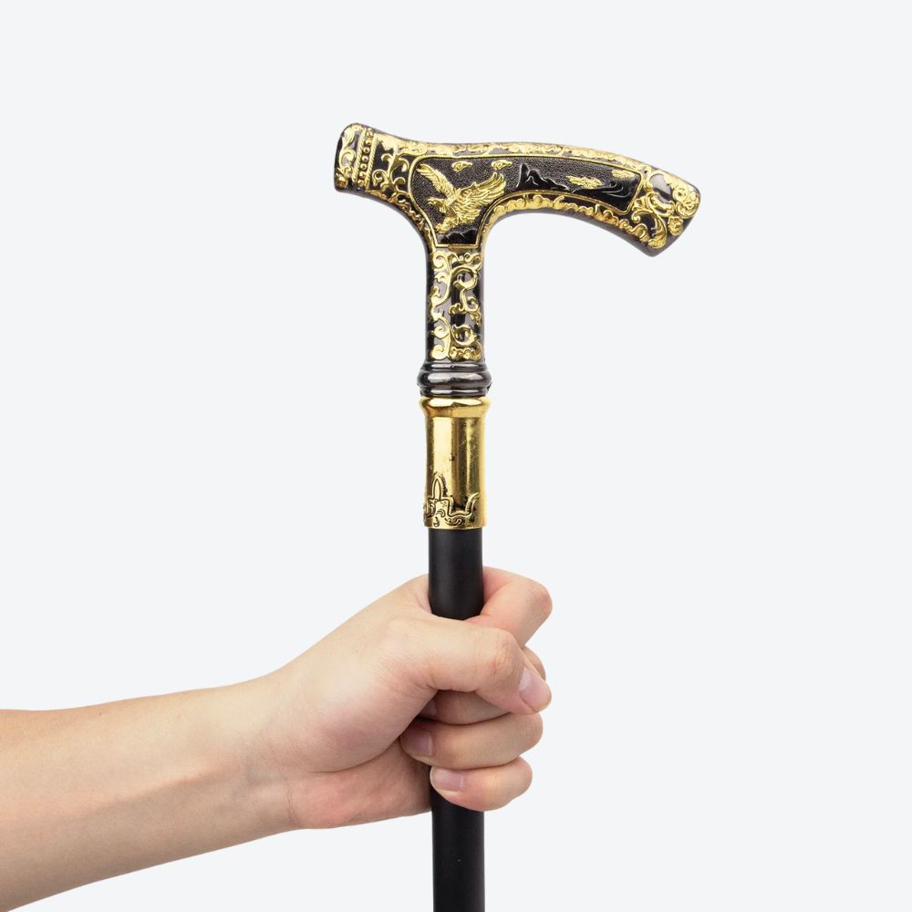 Elegant walking stick with golden eagle handle and dark wood - Bastoni